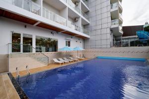 a swimming pool in the middle of a building at Summer Dream Hotel in Phú Quốc