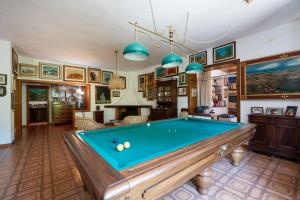 a living room with a pool table at B&B A Casa Di Gina in Polignano a Mare