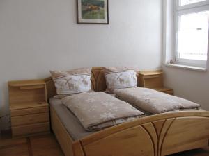 En eller flere senge i et værelse på Reiterhof & Pension Lienemann