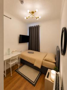 โทรทัศน์และ/หรือระบบความบันเทิงของ Studio 34