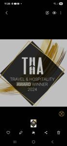 a logo for a travel and hospitality award winner at Rockfield Manor B&B, Knock in Knock