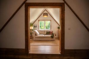 a living room with a couch and a window at Frein Chalets - Kaltenbach 1A in Frein +3 photos