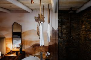 a bathroom with a sink and a mirror at Bly B&B in Pretoria +119 photos