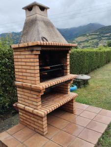 a brick oven sitting on top of a patio at Ca Blanca in Sorribas