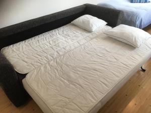 Postel nebo postele na pokoji v ubytování Lilla Skottek
