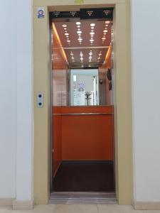 an elevator door in a building at HOME CENTRO B max 5 personas HOME CENTRO A max 6 personas in Marchena