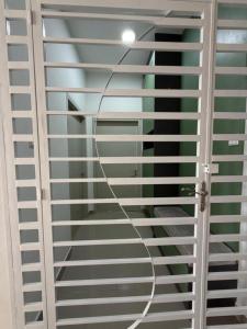 a room with a window with blinds at Sufi Idaman Studio for Islamic only in Nilai +4 photos