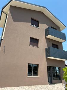 a building with balconies on the side of it at Girasole in Motta