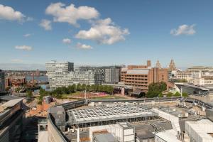 an overhead view of a city with a building at Cove Paradise Street in Liverpool