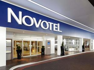 a novisor sign on the side of a building at Novotel London West in London