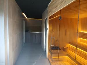 a bathroom with a shower and a glass wall at Vila Golijat in Raška +64 photos