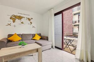 a living room with a couch and a table at NG CANDELARIA - Tenerife in Candelaria