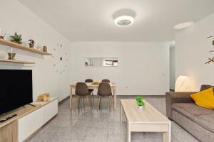 a living room with a couch and a table at NG CANDELARIA - Tenerife in Candelaria