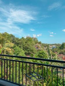 a view from the balcony of a resort at Heri house ubud in Ubud