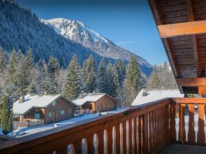 a view from the balcony of a cabin in the mountains at Chalet Igel - OVO Network in Châtel