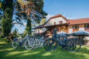 a group of bikes parked in front of a building at Noclegi Staś Krasnobród in Krasnobród