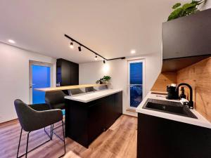 a kitchen with a sink and a counter top at Fewo im Taubenhaus in Bad Lausick
