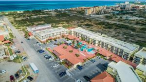 an overhead view of a city with buildings and the ocean at Only 350 yards from Eagle Beach! in Palm-Eagle Beach