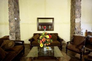 Posezení v ubytování Hotel Quinta Mision