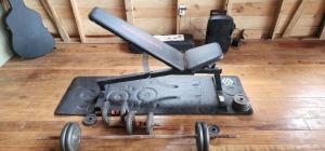 a machine with wheels on the floor with a guitar at SEGUNDA BRISA in Tucker Bight +30 photos