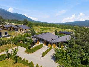an aerial view of a house with a garden at Pirin Golf Villa in Bansko
