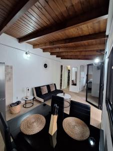 a living room with a couch and a table at La Campestre in La Guancha
