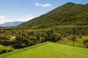 a balcony with a view of a mountain at Merus in Faicchio
