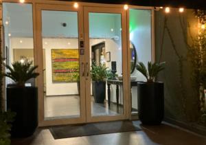 a room with potted plants in front of a door at Casa Condado Hotel & Residences in San Juan