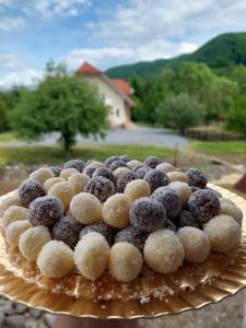a close up of a cake on a plate at Halasto Pension in Praid