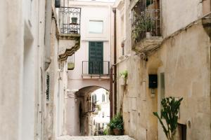 an alley in an old town in malta at La Casa di Nadì in Matera