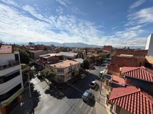 an overhead view of a city street with buildings at Altos de Belgrano Suites in Tarija