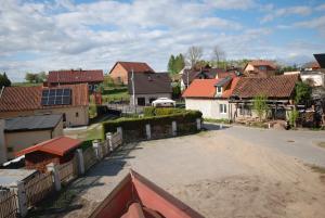 a view of a town with houses and a street at Noclegi Dywity Barczewskiego 27 in Dywity