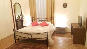 Postel nebo postele na pokoji v ubytování Garden Suite
