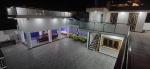 an overhead view of a large room with tables and chairs at JPR Heritage Villa in Pondicherry
