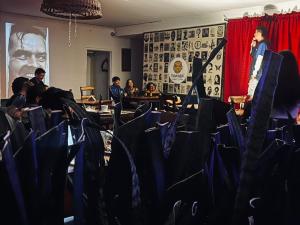 a group of people sitting in a room with chairs at Hostal Cultural Casa Morobik in Popayan