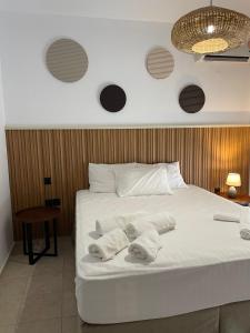 Ліжко або ліжка в номері Inside Apartment