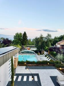 a view of a swimming pool from a house at Vita Serena in Gyenesdiás