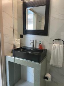 Ванна кімната в Inside Apartment +27 фото