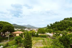 a view of a town with mountains in the background at Casa Rucola in Sestri Levante