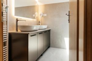 a bathroom with a sink and a mirror at Villa Žnjan in Split