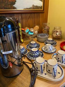 a table with blue and white dishes and a blender at Öndólfsstaðir Farm B&B in Laugar +62 photos