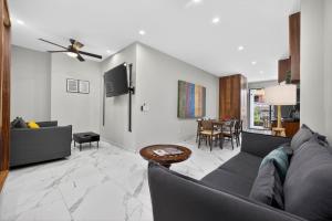 a living room with a couch and a table at Unit Aguacates Romantic Zone in Puerto Vallarta