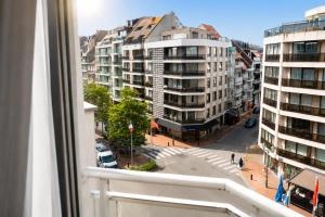 a view from a window of a city with buildings at Vertry at Sea, Luxury Apartment Knokke in Knokke-Heist