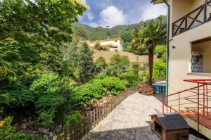 a view from the balcony of a house at Casa da Lagoa II in Terras de Bouro