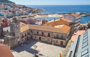 an aerial view of a city with a clock tower at Casa de la bis in A Guarda +11 photos