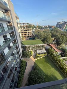 an aerial view of a building with a grass yard at The Snug Stay - Lennox in Accra