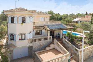 an aerial view of a house with a solarium at Your Island Villa Son Serra in Son Serra de Marina