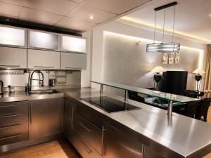a kitchen with a sink and a counter top at Private Luxury Villas at Sharm Dreams Vacation Club in Sharm El Sheikh
