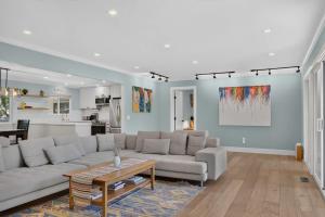 a living room with a couch and a table at The Enso Sonoma in Glen Ellen