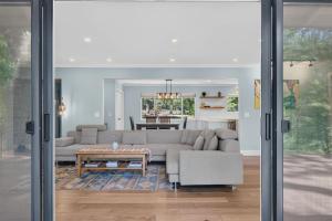 a living room with a couch and a table at The Enso Sonoma in Glen Ellen +24 photos